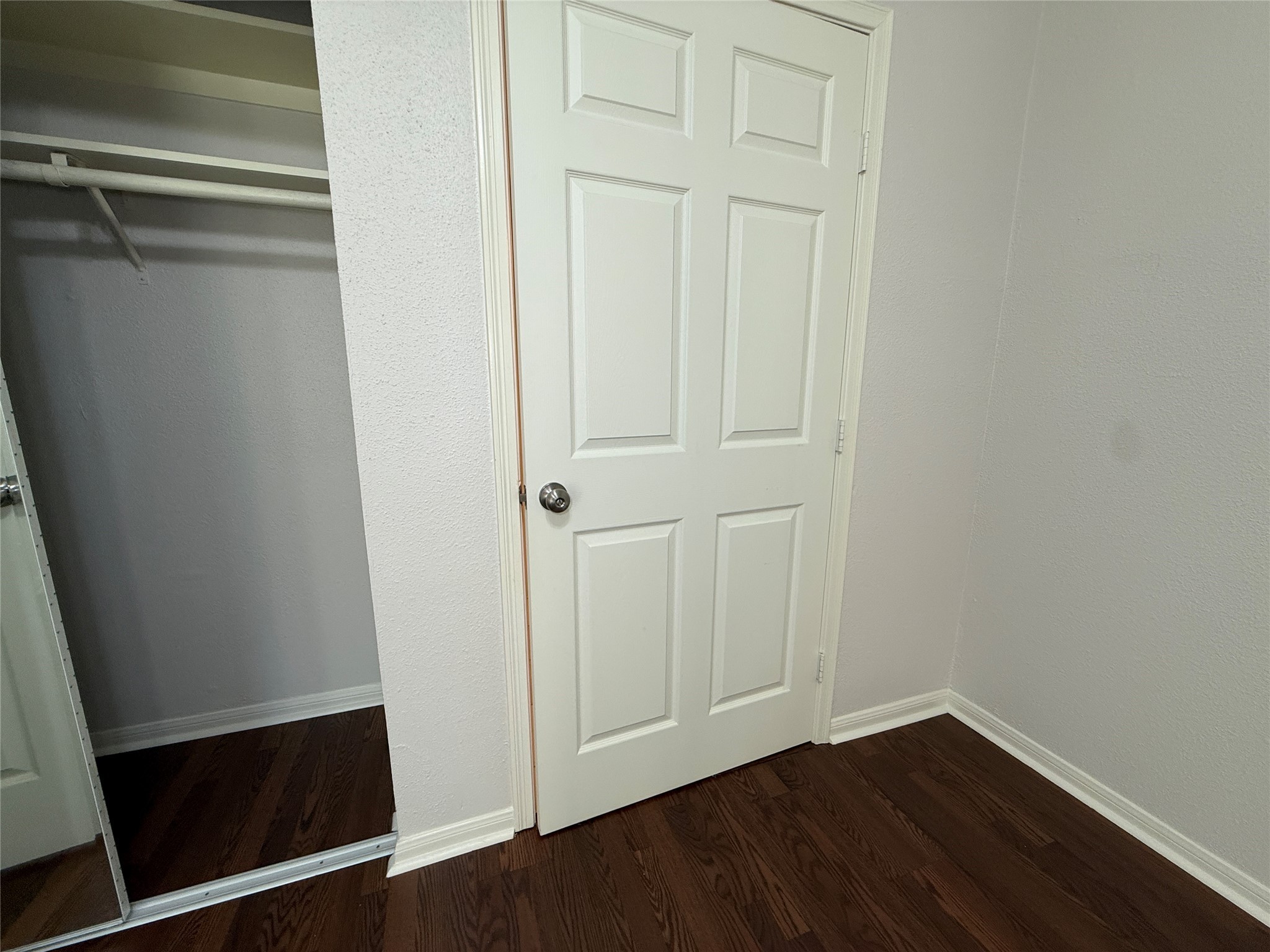 2125 Augusta Drive, Unit 83 Houston, TX 77057 - Photo 24 of 34 a view of front door with wooden floor