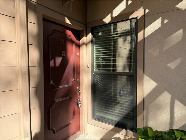 a kitchen with stainless steel appliances granite countertop a refrigerator and a stove