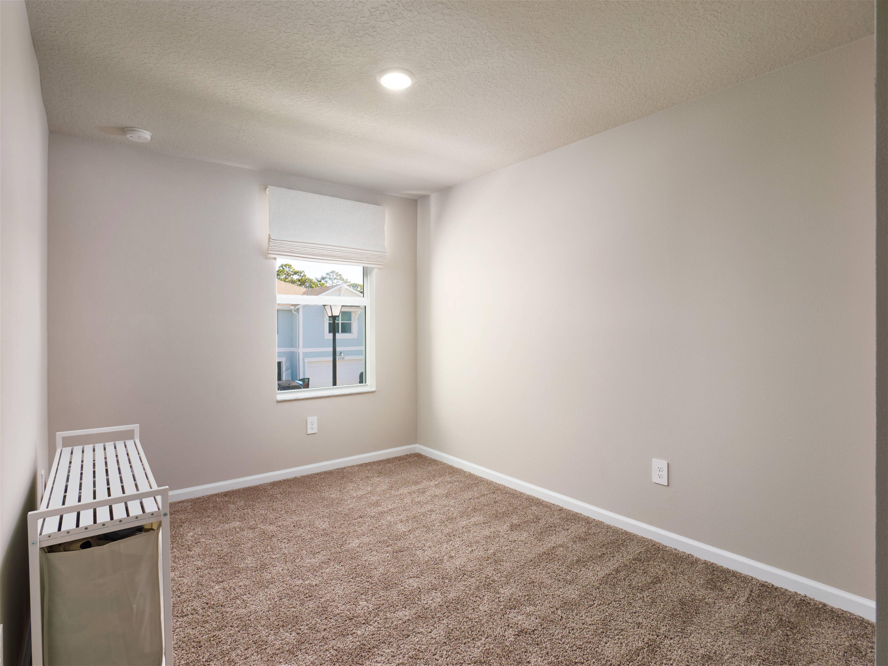 5735 Southeast Edgewater Circle Stuart, FL 34997 - Photo 22 of 39 an empty room with windows