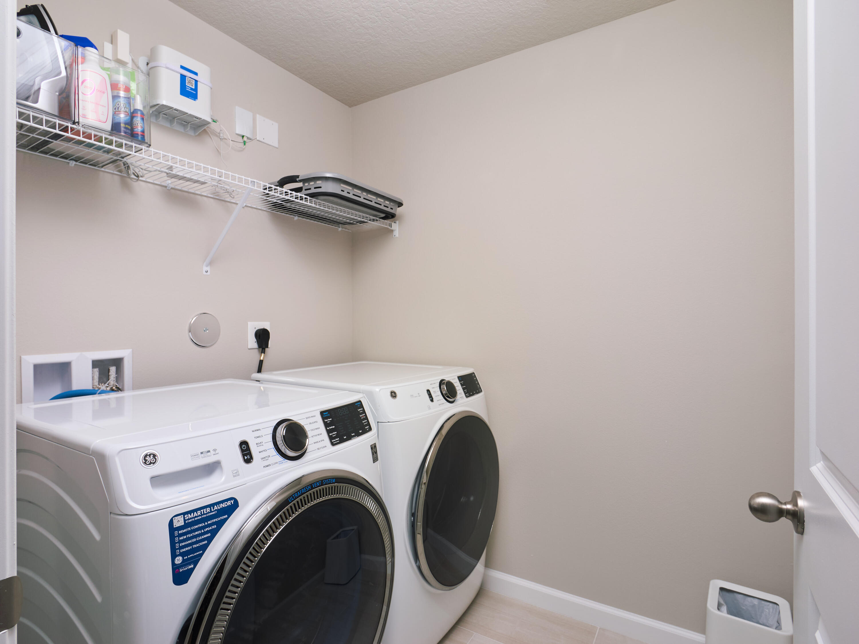 5735 Southeast Edgewater Circle Stuart, FL 34997 - Photo 23 of 39 a utility room with dryer and washer