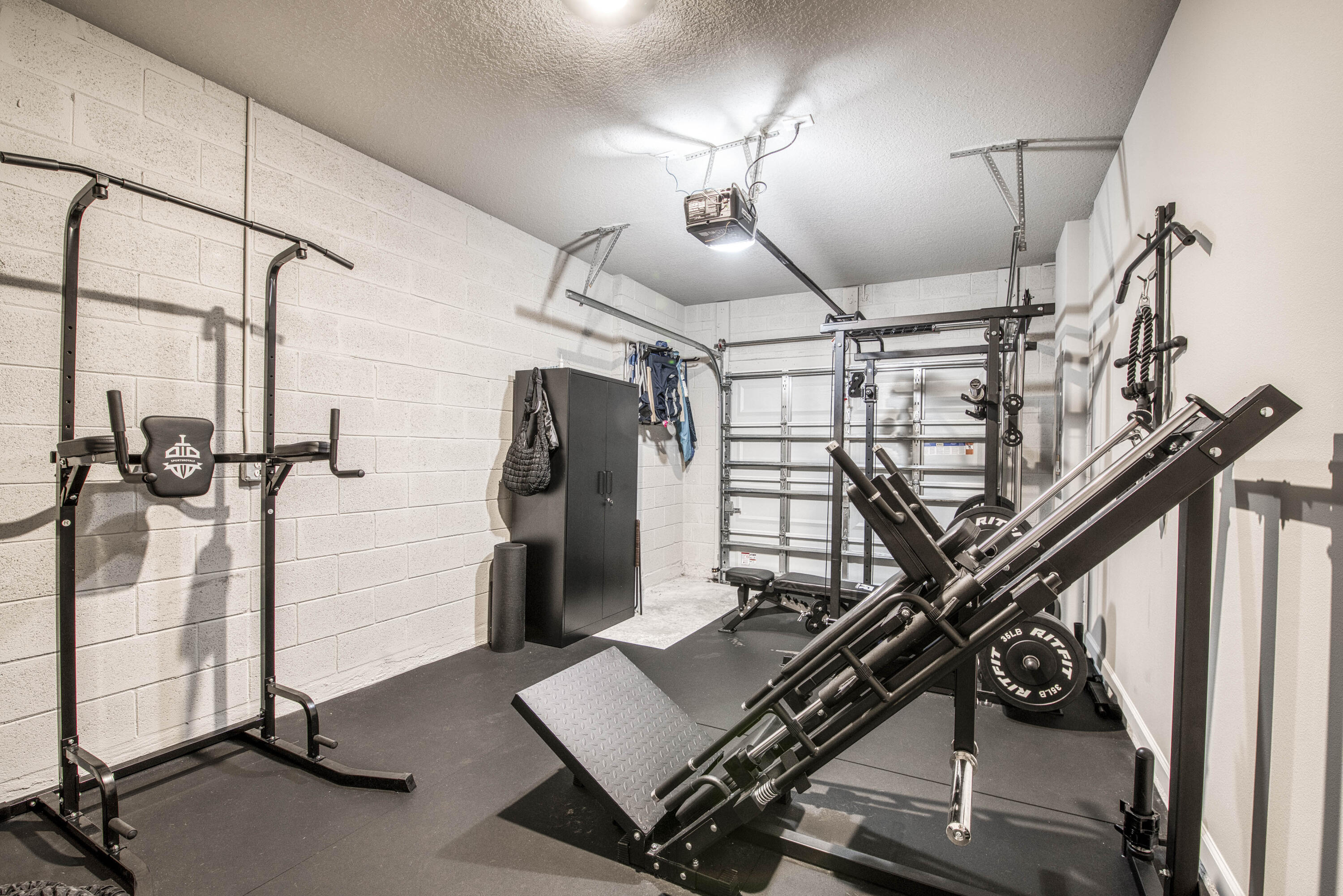 5735 Southeast Edgewater Circle Stuart, FL 34997 - Photo 24 of 39 a view of a room with gym equipment