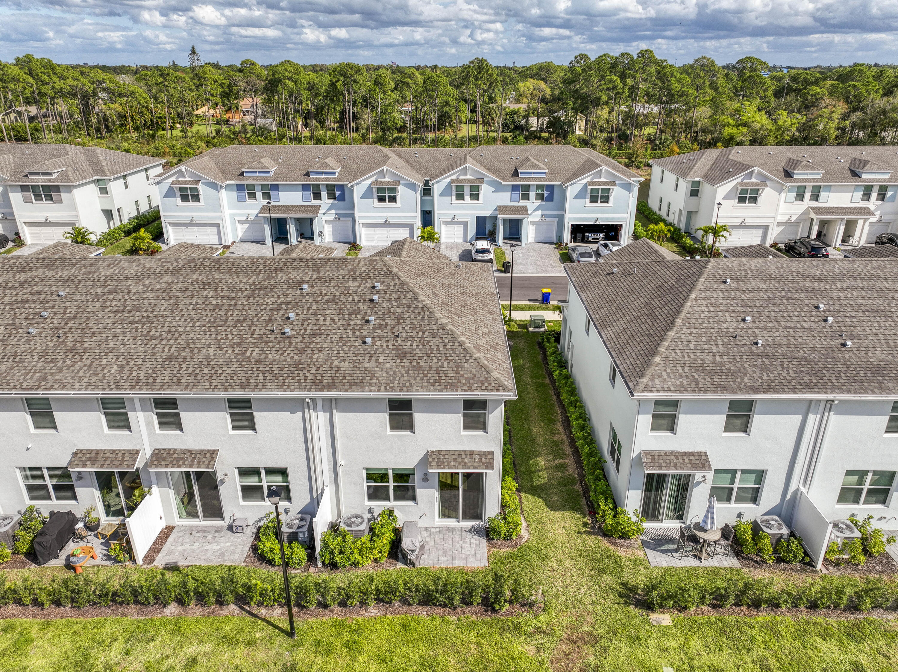 5735 Southeast Edgewater Circle Stuart, FL 34997 - Photo 33 of 39 an aerial view of residential houses with yard
