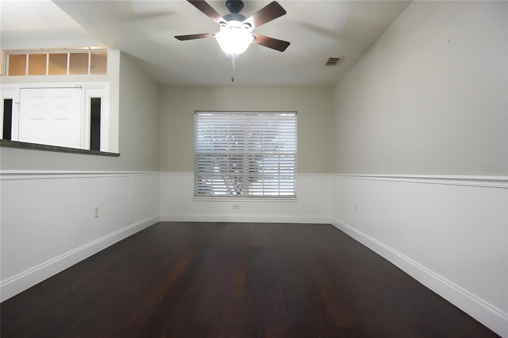 12042 Linden Drive Spring Hill, FL 34608 - Photo 6 of 41 a view of an empty room with a window