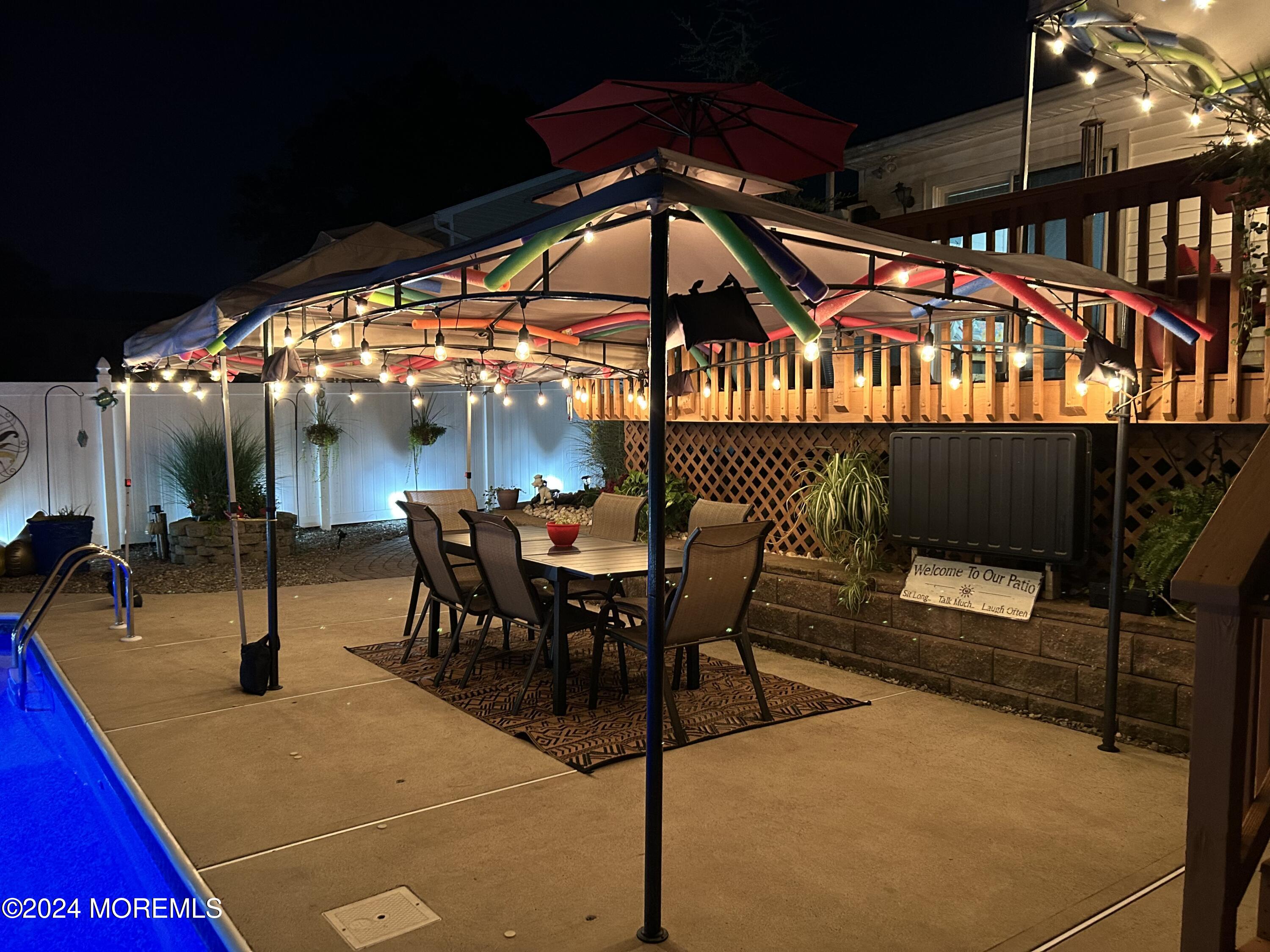 136 Smith Circle Point Pleasant, NJ 08742 - Photo 18 of 35 a view of an chairs and tables in patio