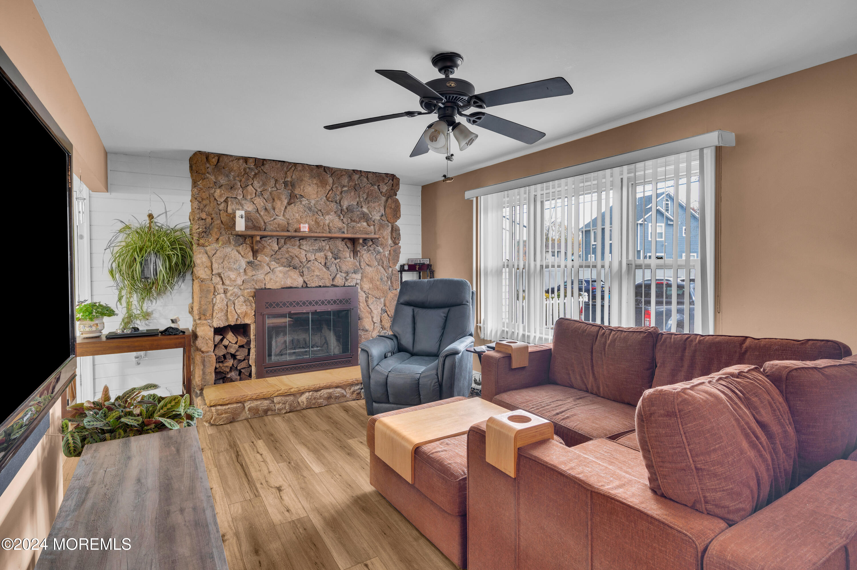 136 Smith Circle Point Pleasant, NJ 08742 - Photo 4 of 35 a living room with furniture and a fireplace