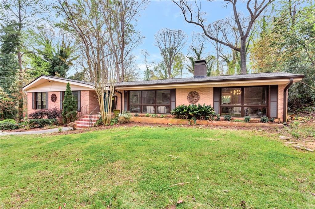 2994 Baker Ridge Drive Northwest Atlanta, GA 30318 - Photo 1 of 1 a view of a house with swimming pool and porch