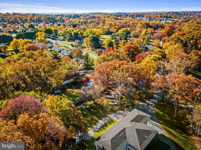 an aerial view of residential building and parking space