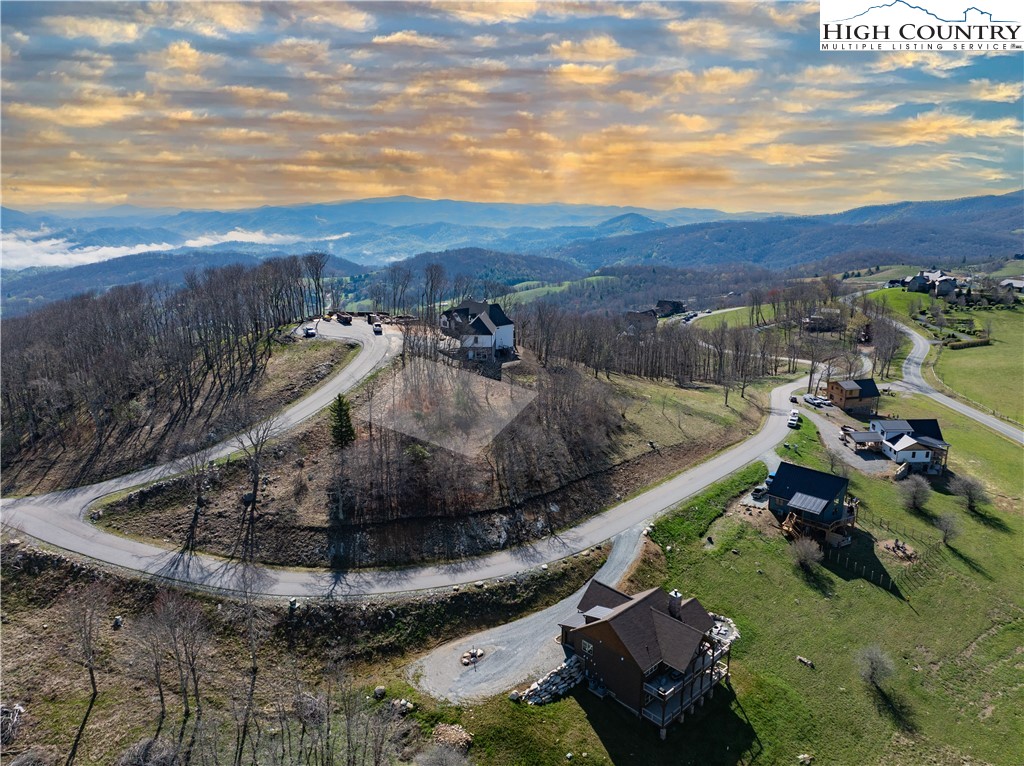 Lot 64 Valley Ridge Banner Elk, NC 28604 - Photo 9 of 10 a view of a house with a yard