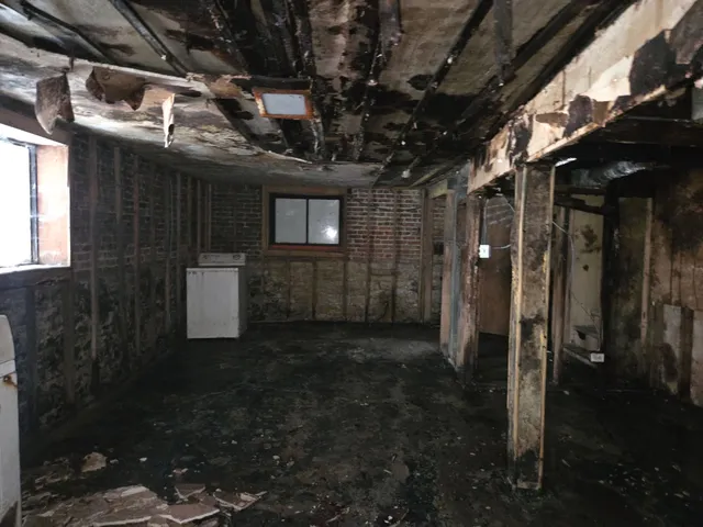 an empty room with windows