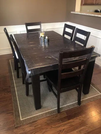a view of dining room and wooden floor