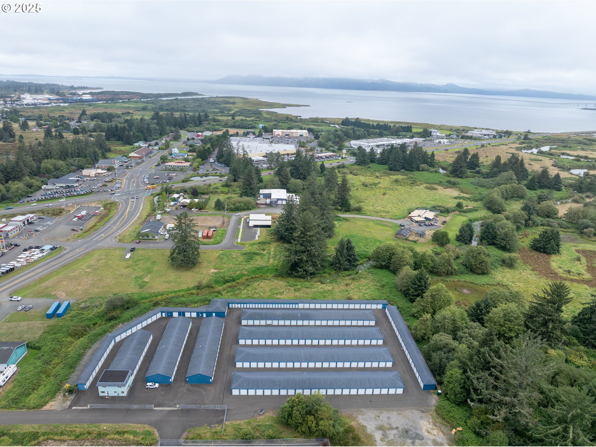 10 Southeast Se Street Warrenton, OR 97146 - Photo 3 of 8 an aerial view of a residential houses with outdoor space and street view
