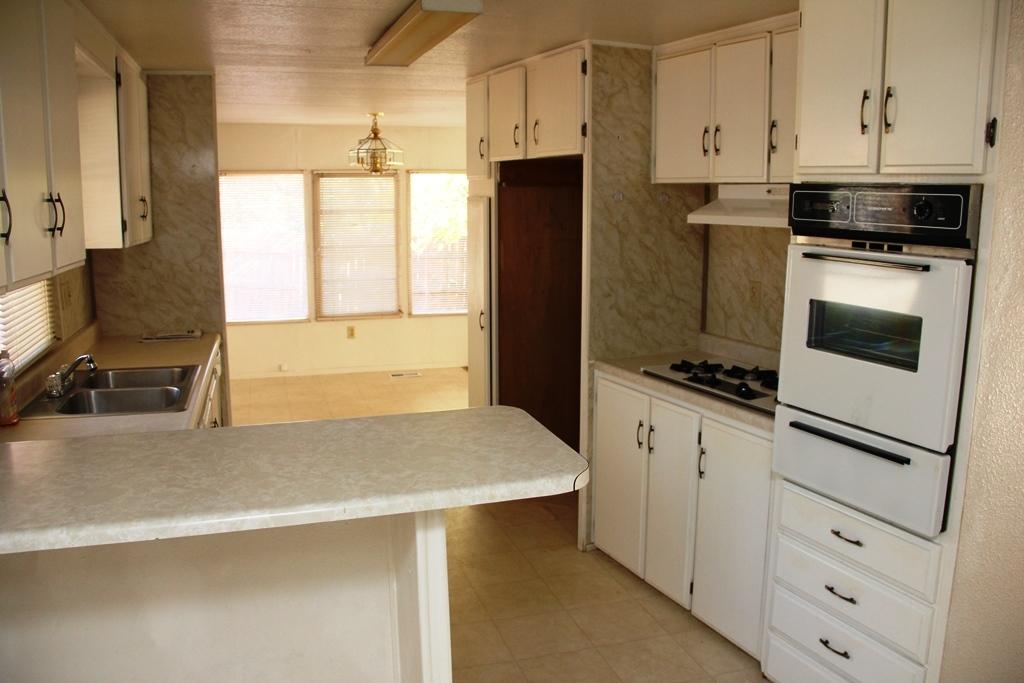 9322 Placer Road Redding, CA 96001 - Photo 8 of 28 Kitchen to Dining Room
