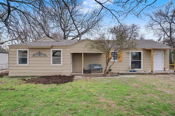 front view of house with a yard