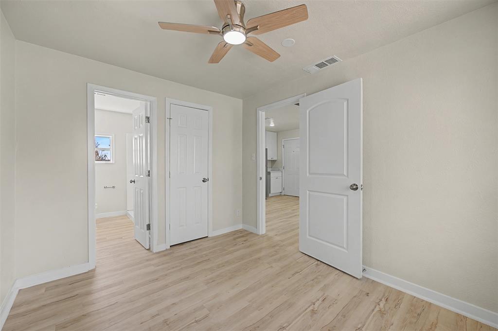 9021 White Settlement Road White Settlement, TX 76108 - Photo 29 of 33 a view of empty room with wooden floor