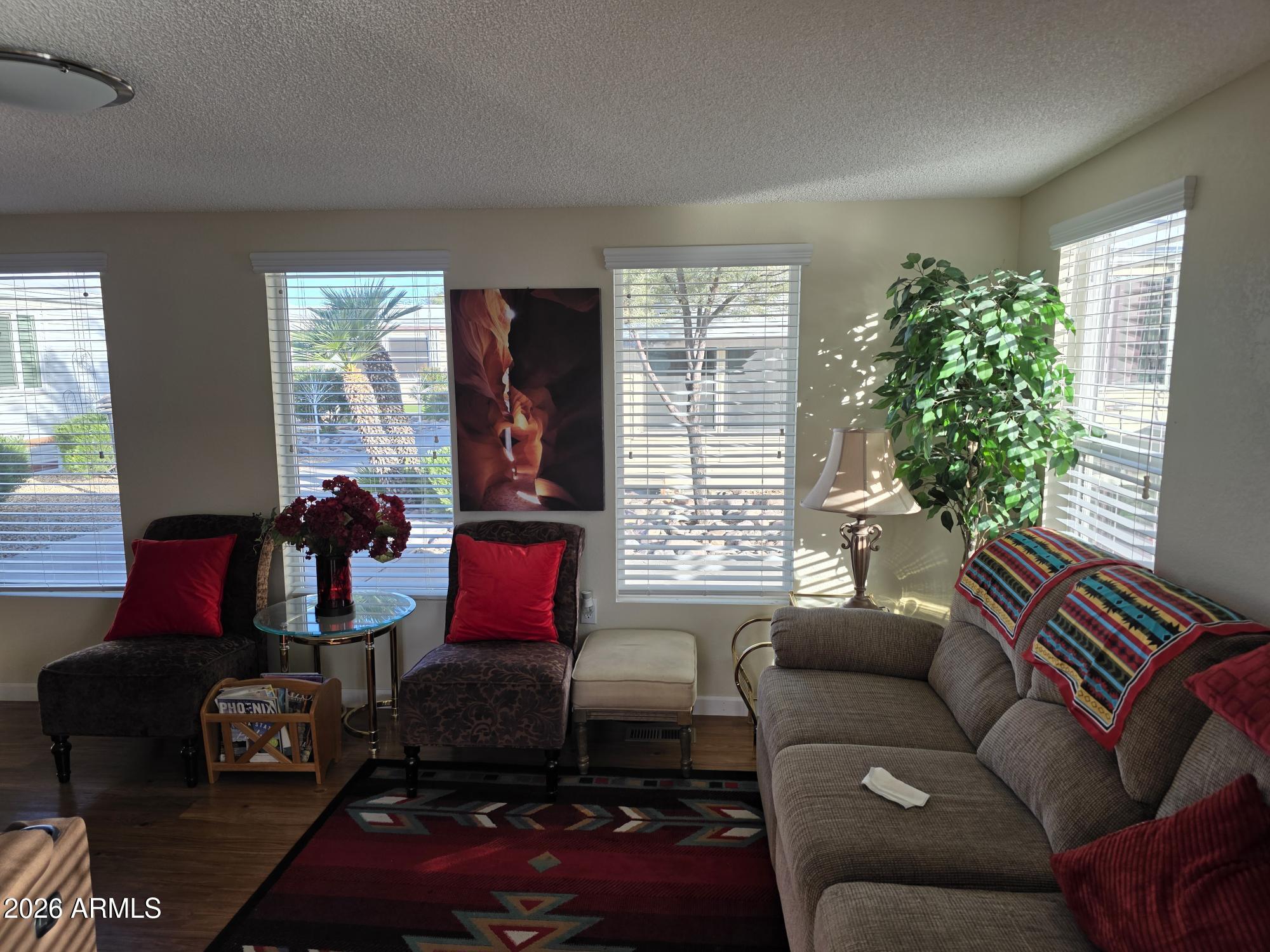 17200 West Bell Road, Unit 2169 Surprise, AZ 85374 - Photo 11 of 25 a living room with furniture and a window
