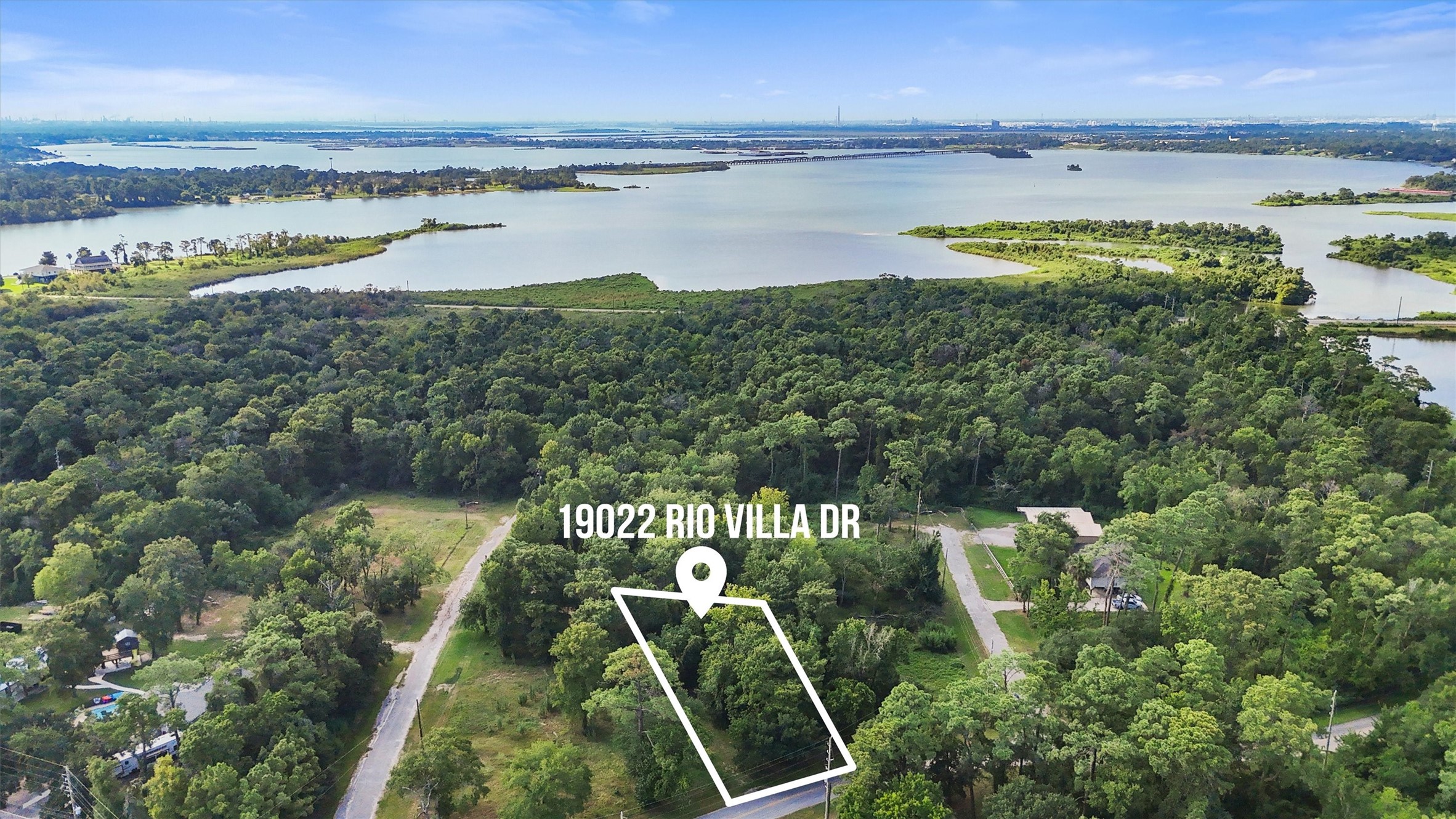 19022 Rio Villa Drive Houston, TX 77049 - Photo 6 of 6 a view of a city and lake