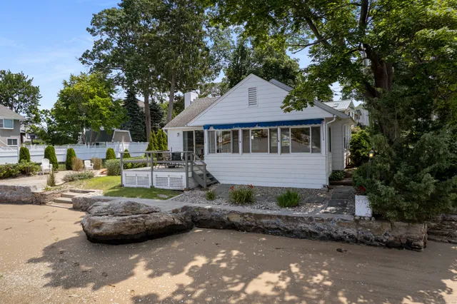 a kitchen with stainless steel appliances a sink stove and a refrigerator