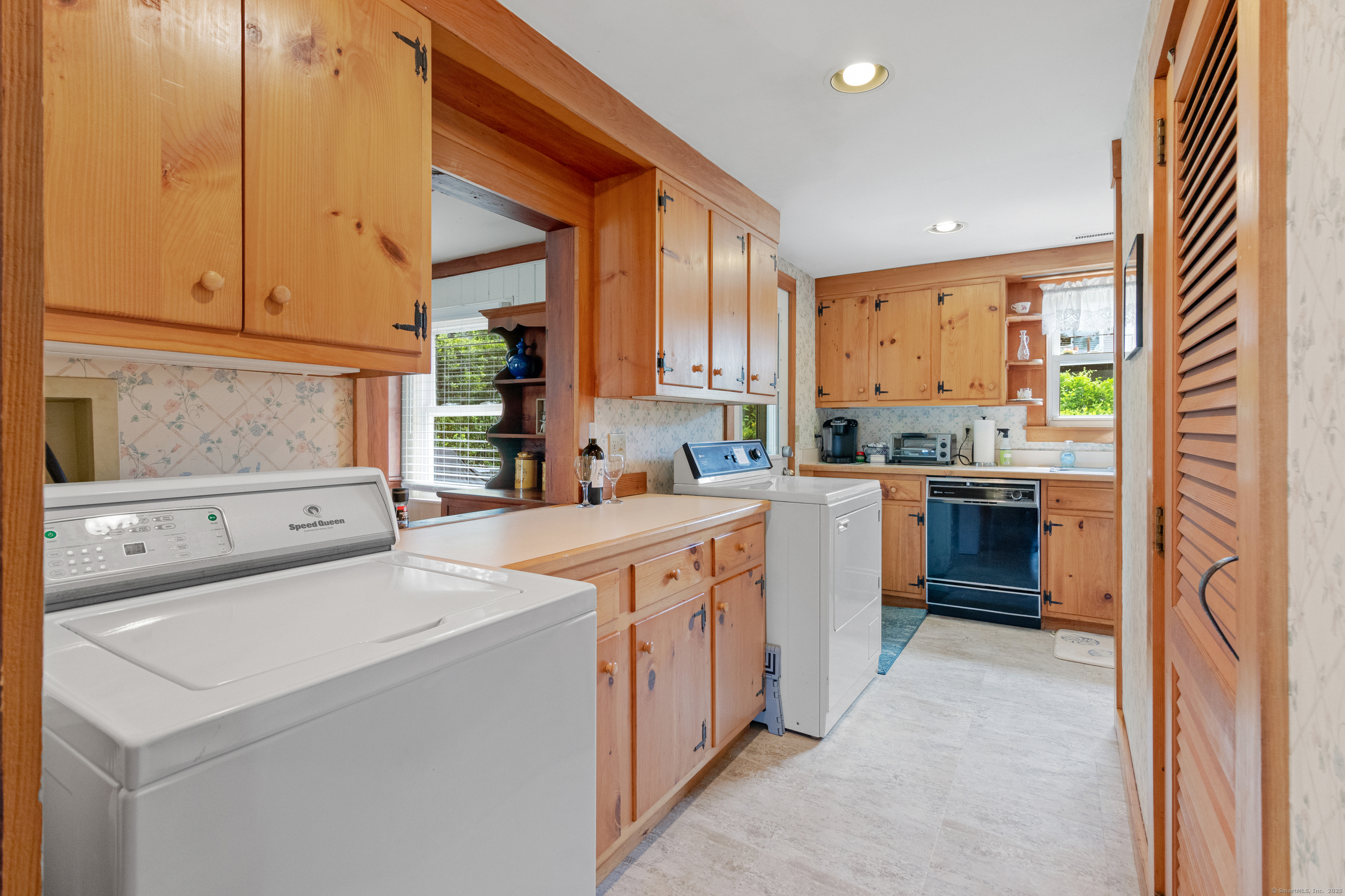 15 River Road Branford, CT 06405 - Photo 17 of 32 a kitchen with lot of counter top space and cabinets