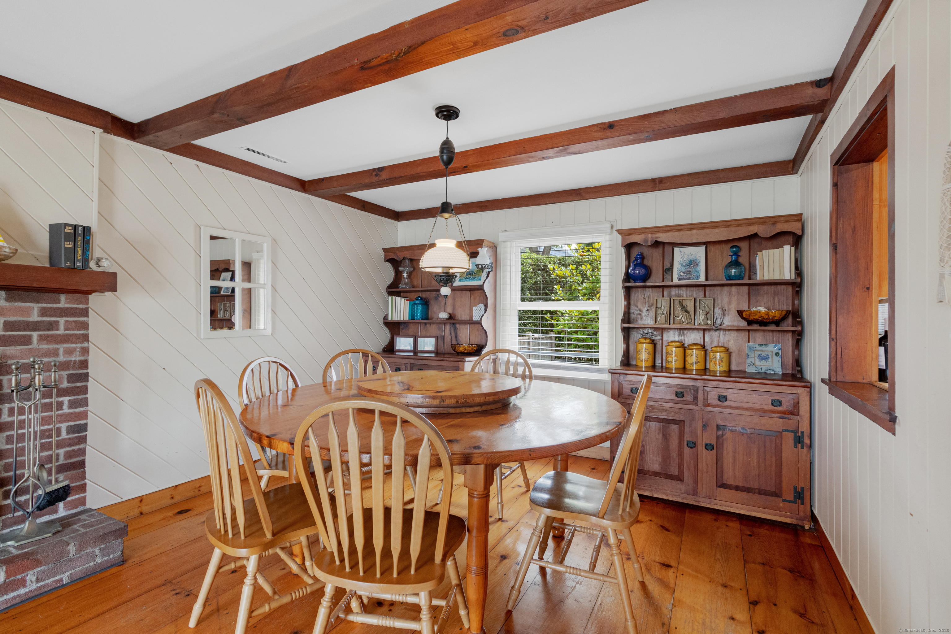 15 River Road Branford, CT 06405 - Photo 18 of 32 a dining room with furniture and wooden floor