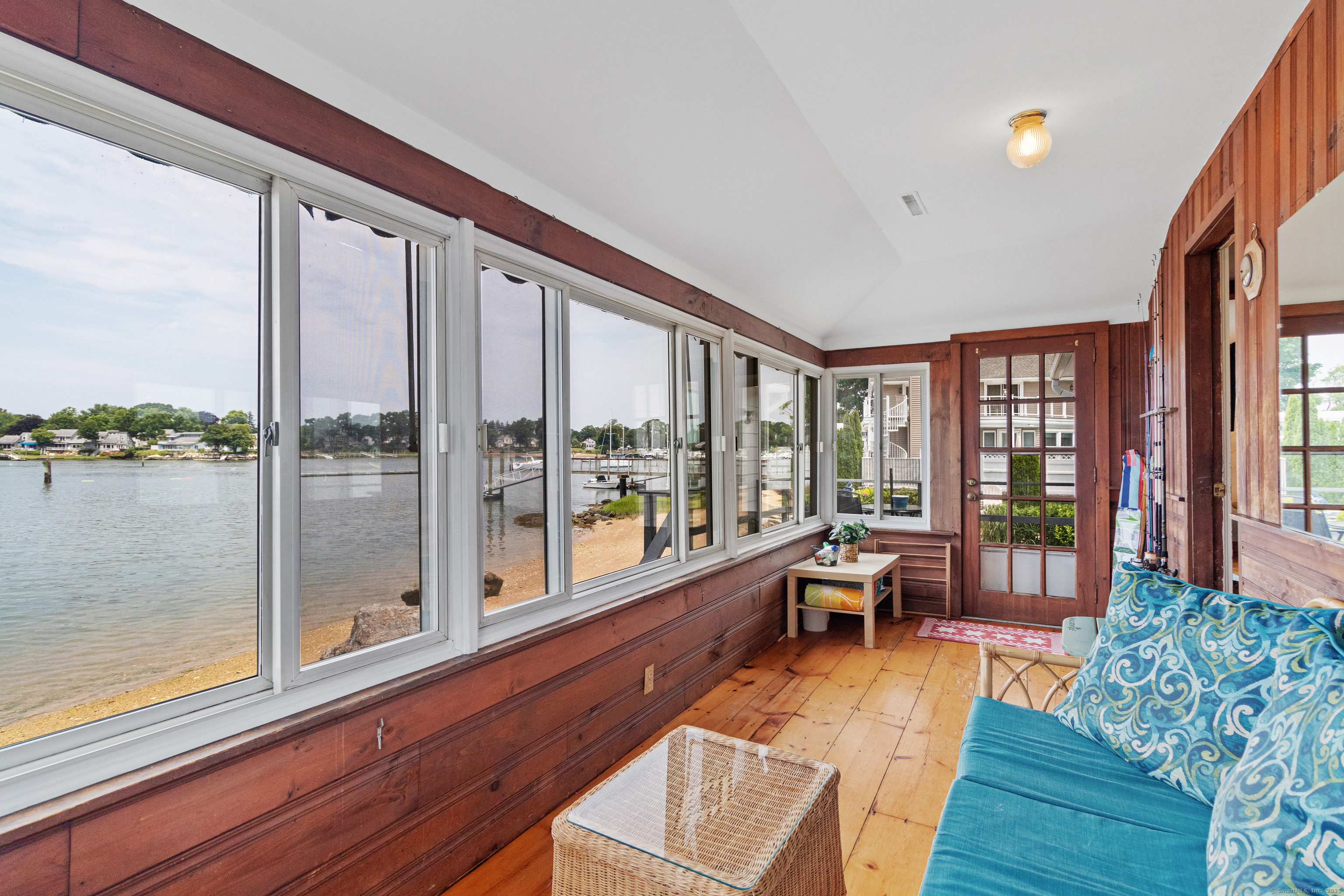 15 River Road Branford, CT 06405 - Photo 22 of 32 a living room with furniture and windows