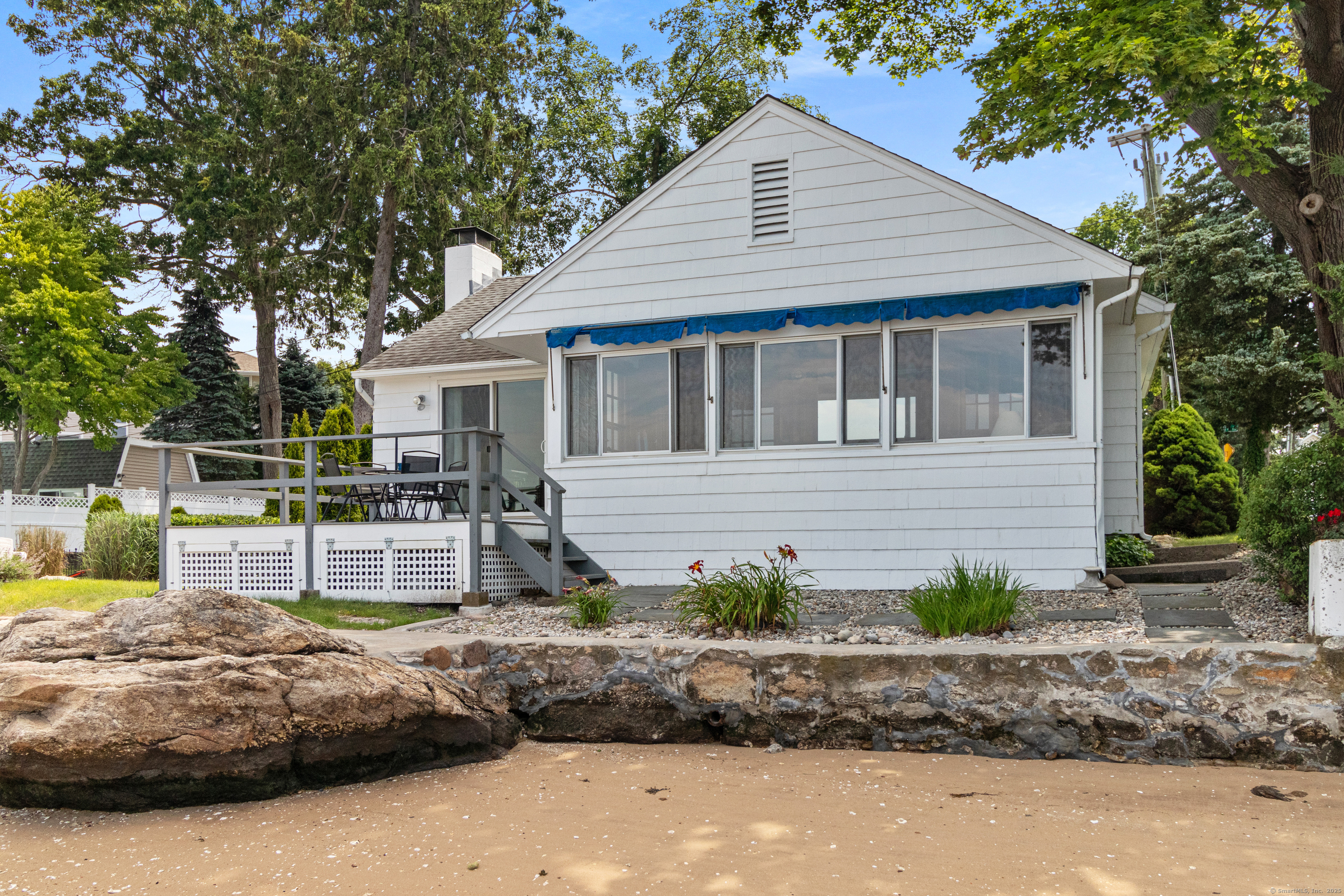 15 River Road Branford, CT 06405 - Photo 28 of 32 a view of a house with backyard and sitting area