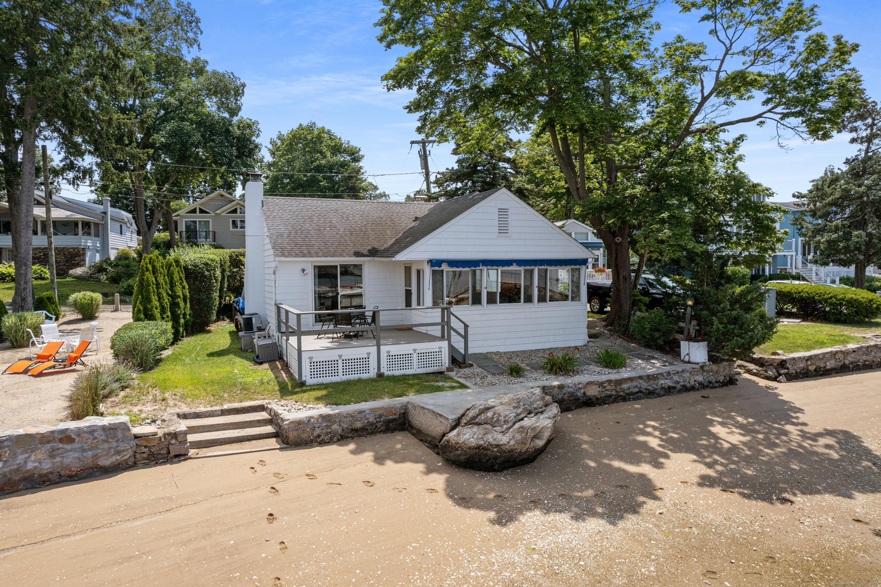 15 River Road Branford, CT 06405 - Photo 10 of 32 a view of a house with backyard and sitting area