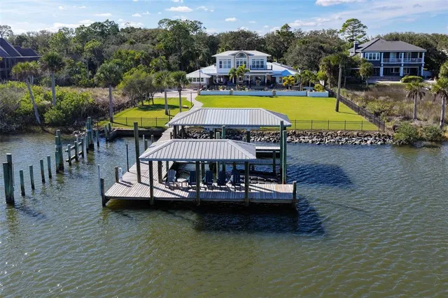 a view of a swimming pool with a lounge chair