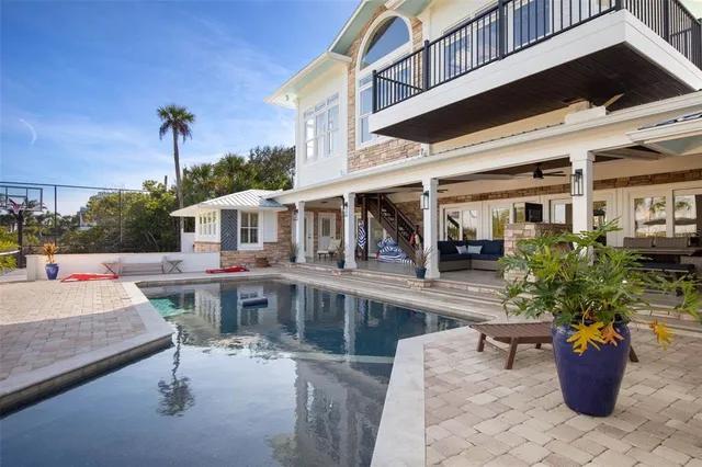 a view of a dining room with furniture and window