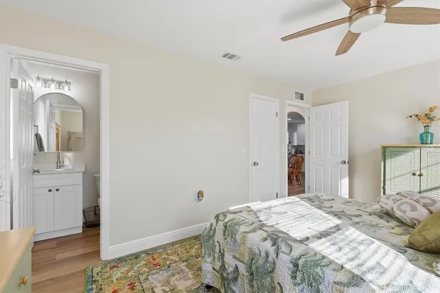 a bedroom with a bed and closet