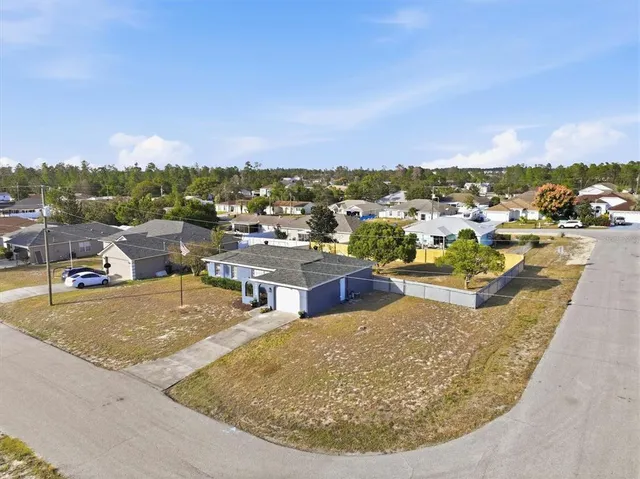 a view of a swimming pool with an ocean view