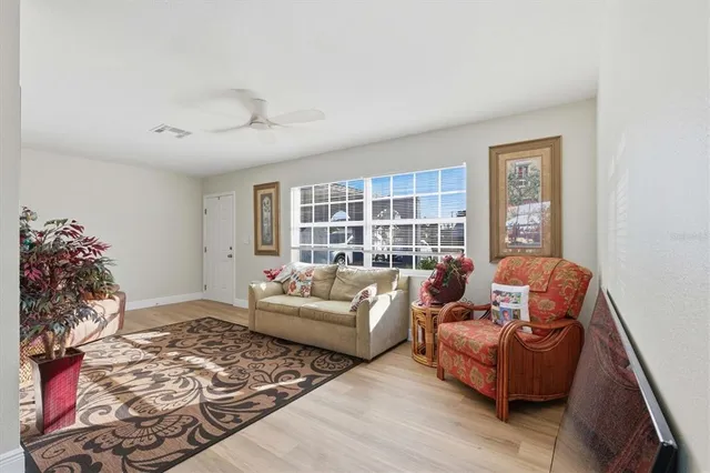 a living room with furniture and a window