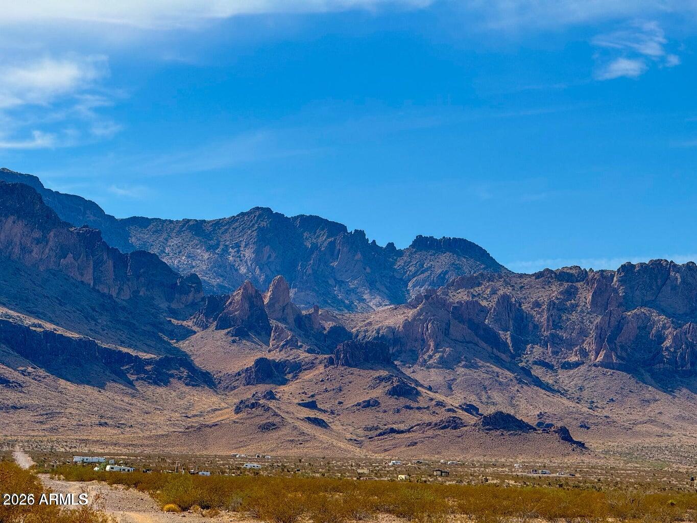 a view of a lake with mountains in the background