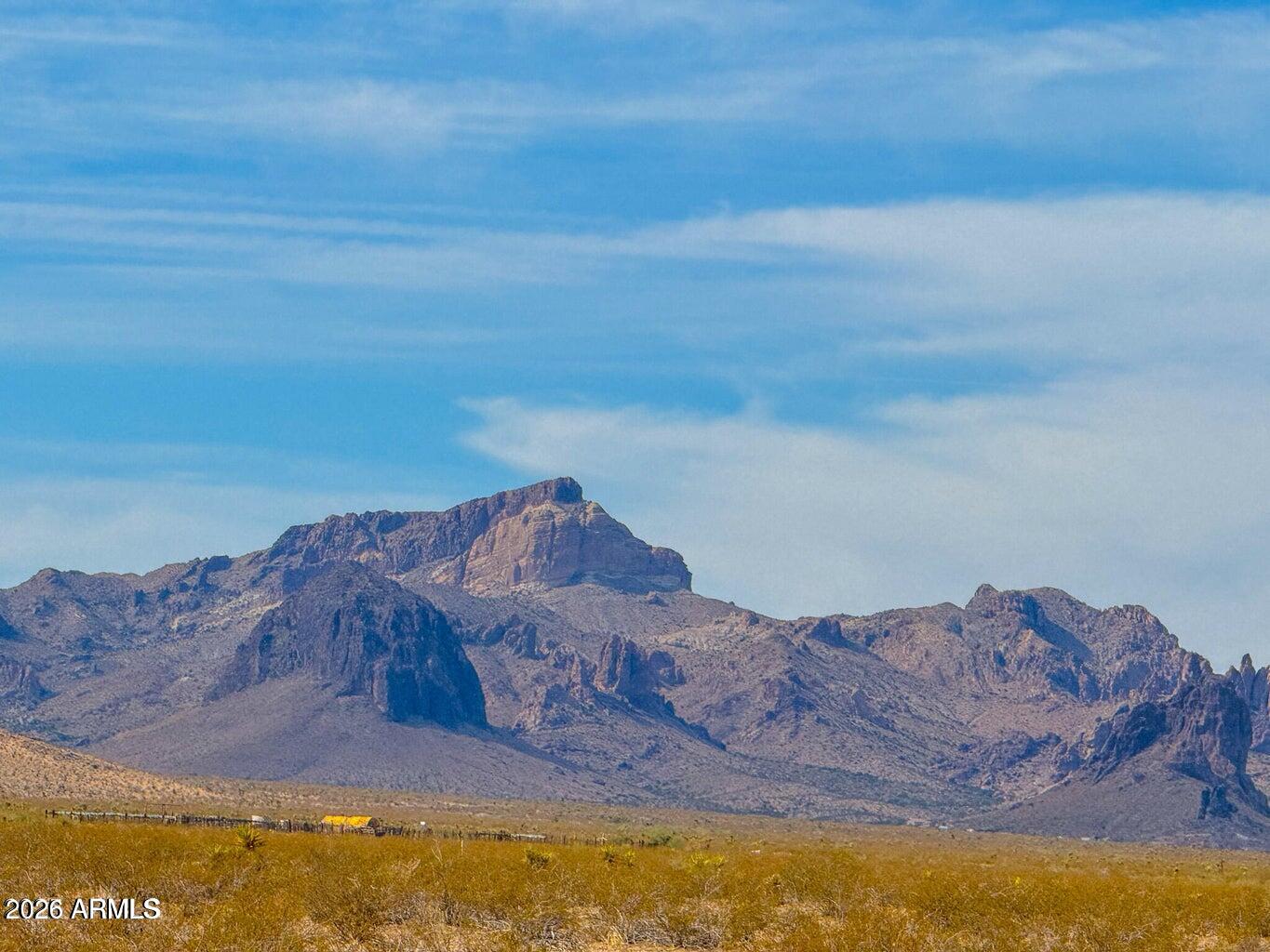 0 West Wingate Golden Valley, AZ 86413 - Photo 17 of 19 a view of a large body of water with a mountain in the background