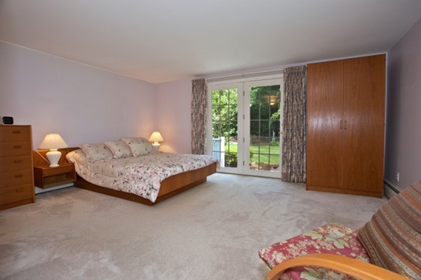 18 Chatham Way Lynnfield, MA 01940 - Photo 15 of 28 a bedroom with a bed and window