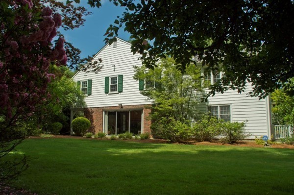 18 Chatham Way Lynnfield, MA 01940 - Photo 20 of 28 a front view of a house with a garden and yard