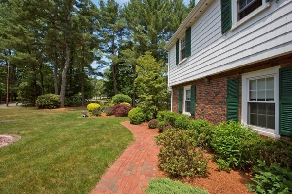 18 Chatham Way Lynnfield, MA 01940 - Photo 23 of 28 a front view of a house with a yard and garage
