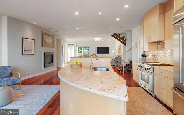 a view of a hallway with paintings on the wall