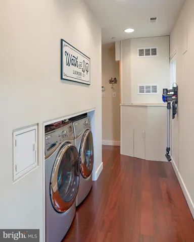 a bathroom with a shower and a sink