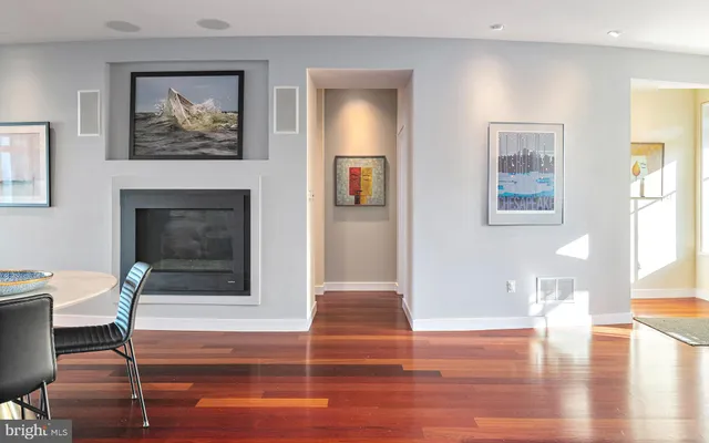 a bathroom with a bath tub with a shower