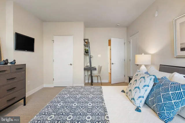 a bathroom with a sink vanity and a mirror