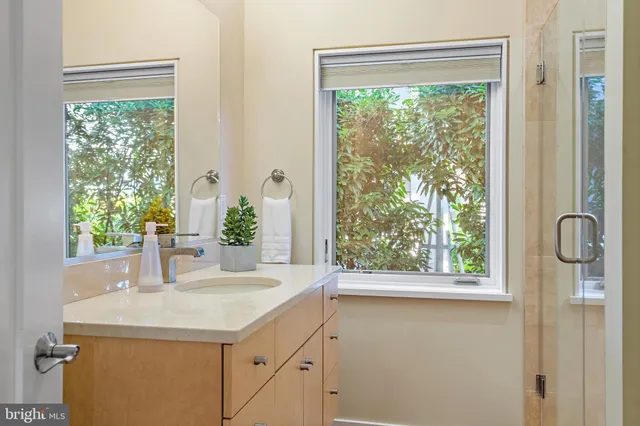 an aerial view of a house with outdoor space