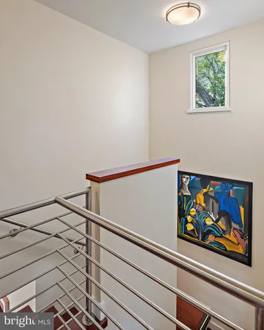 an aerial view of a house with a lake view