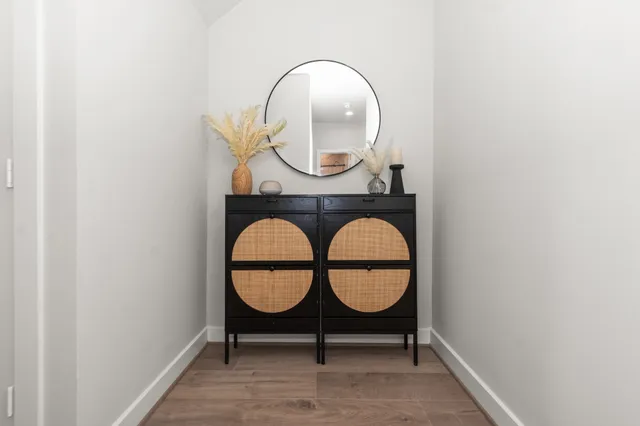 a room with furniture and wooden floor