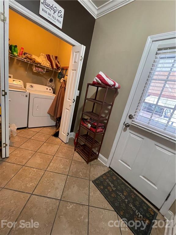 770 Padgett Road Union Mills, NC 28167 - Photo 2 of 48 a view of washer and dryer with a bathroom in the background