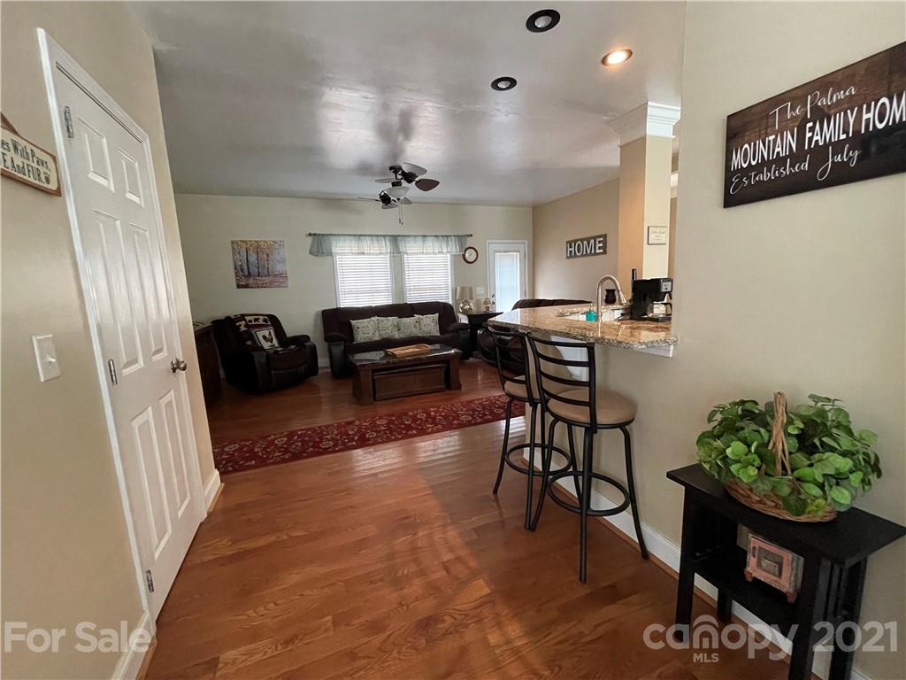 770 Padgett Road Union Mills, NC 28167 - Photo 14 of 48 a view of a livingroom with furniture wooden floor and a rug
