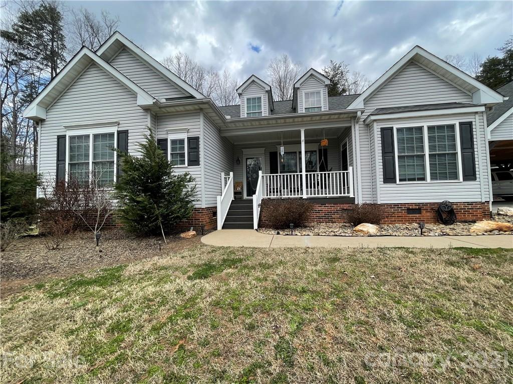 770 Padgett Road Union Mills, NC 28167 - Photo 16 of 48 a front view of a house with garden