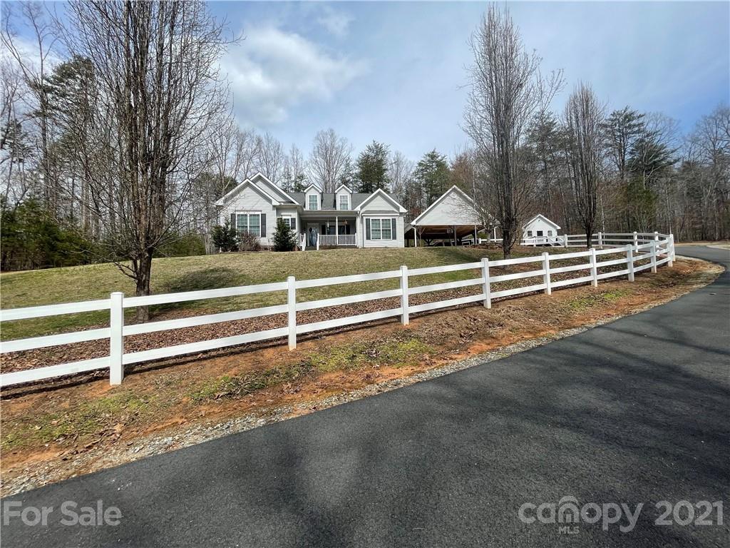 770 Padgett Road Union Mills, NC 28167 - Photo 21 of 48 a view of a house with a yard and large trees