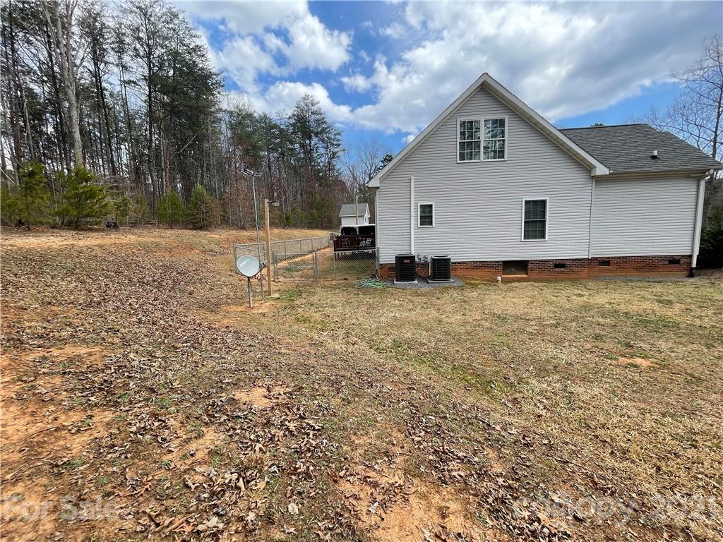 770 Padgett Road Union Mills, NC 28167 - Photo 34 of 48 a view of a house with a yard