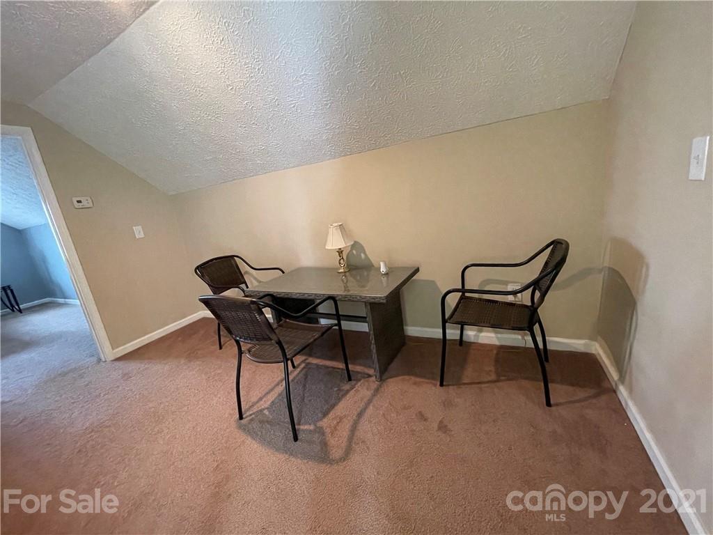 770 Padgett Road Union Mills, NC 28167 - Photo 40 of 48 a view of a room with furniture and wooden floor