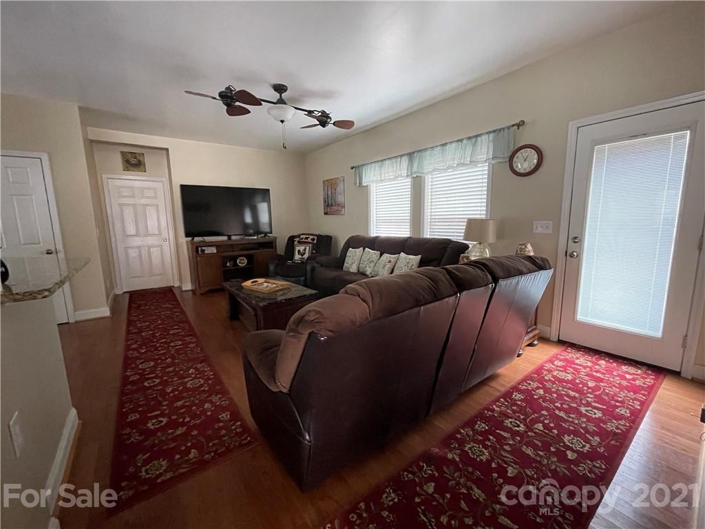770 Padgett Road Union Mills, NC 28167 - Photo 7 of 48 a living room with furniture and a flat screen tv